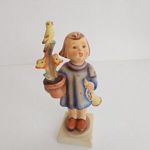 Hummel Figurine with Bird and Flowers